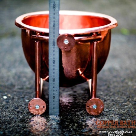 Copper deep wash hand basin showing mountings